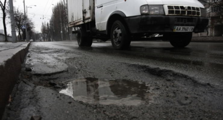 Разбитые дороги в Киеве как никогда обогащают СТО
