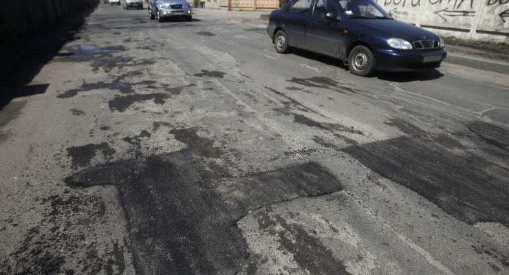 Попов поблагодарил киевлян за контроль ремонта дорог